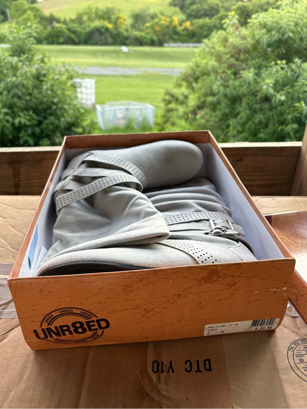 Girls UNR8ED light grey boots.